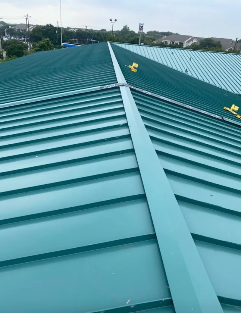 Green commercial metal roof ridge and valley for Metal Roof Repair in Justin